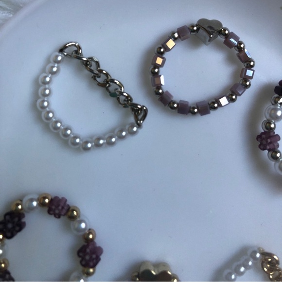 6 gold/silver/purple beaded rings with faux suede mini pouch - Picture 4 of 7